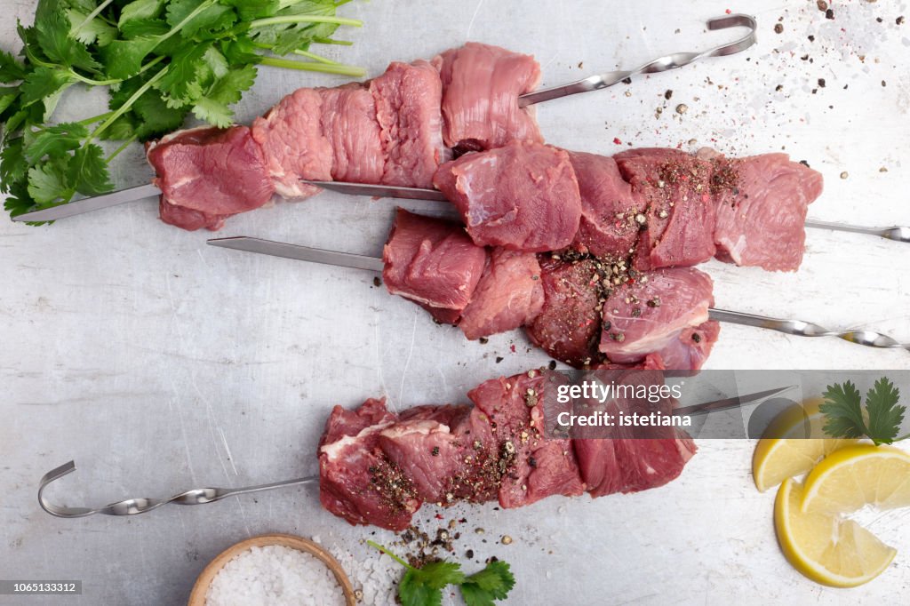 Raw beef skewers ready for grilling