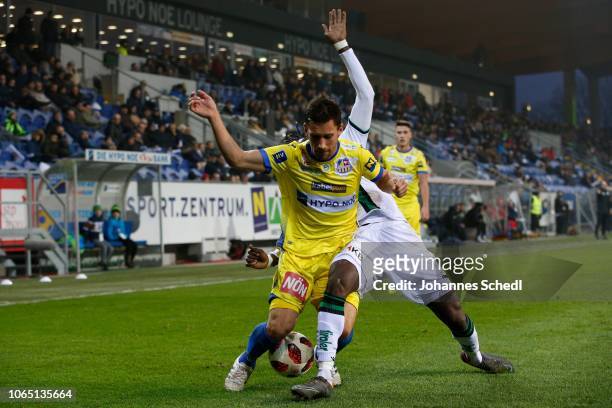 Michael Ambichl of St. Poelten and Cheikhou Dieng of Innsbruck during the tipico Bundesliga match between SKN St. Poelten and FC Wacker Innsbruck at...