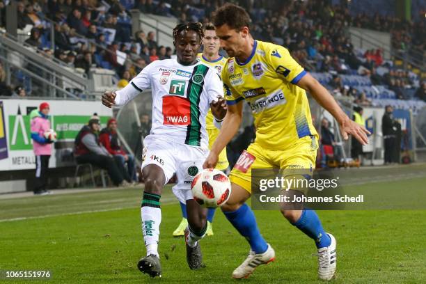 Cheikhou Dieng of Innsbruck and Michael Ambichl of St. Poelten during the tipico Bundesliga match between SKN St. Poelten and FC Wacker Innsbruck at...