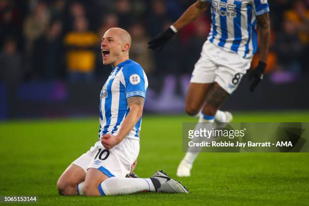 Aaron Mooy of Huddersfield Town celebrates after scoring a goal to make it 0-1 during the Premier League match between Wolverhampton Wanderers and...