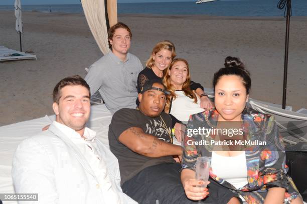 Billy McFarland, Ja Rule, Aisha Atkins with Guests attend Magnises Summer Bash at Gurney's Inn on July 26, 2014 in Montauk, NY.