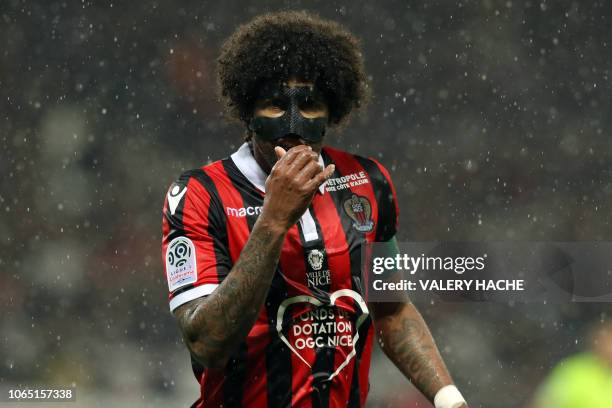 Nice's Brazilian defender Dante reacts during the French L1 football match between Nice and Lille at The "Allianz Riviera" Stadium in Nice,...