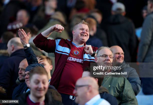 Fan of Aston Villa celebrates during the Sky Bet Championship match between Aston Villa and Birmingham City at Villa Park on November 25, 2018 in...