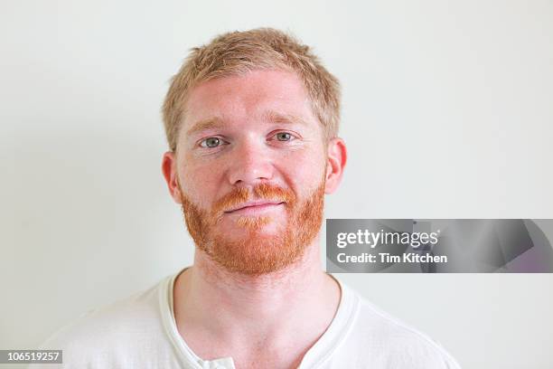 man with blond hair and red beard, smiling - red head man fotografías e imágenes de stock