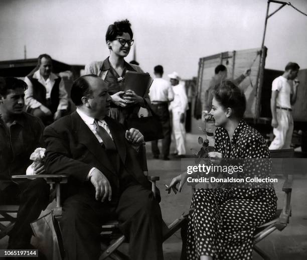 Actress John Hodiak,Alfred Hitchcock,Tallulah Bankhead in a scene from the movie"Lifeboat"