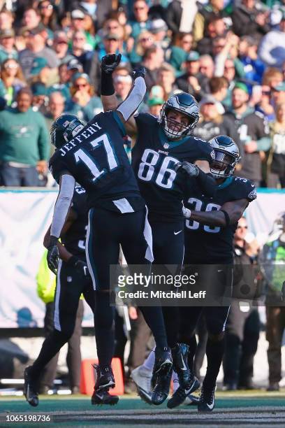 Tight end Zach Ertz of the Philadelphia Eagles celebrates his touchdown with teammates against the New York Giants during the second quarter at...