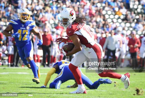Wide receiver Larry Fitzgerald of the Arizona Cardinals catches a pass from quarterback Josh Rosen to tie Jerry Rice at 16,000 receiving yards and...