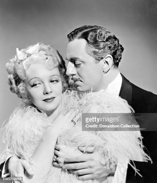 Actress Virginia Bruce and William Powell a scene from the movie "The Great Ziegfeld"