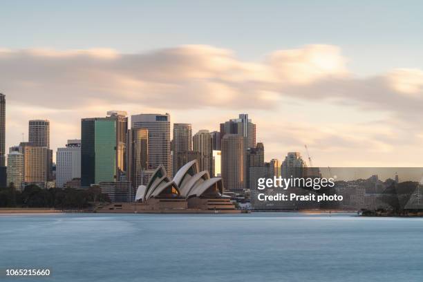 major architecture landmarks of the city of sydney and australia around sydney harbor in elevated aerial view in warm smooth sunlight at the morning. - sydney opera house stock pictures, royalty-free photos & images