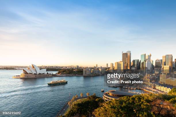 major architecture landmarks of the city of sydney and australia around sydney harbor in elevated aerial view in warm smooth sunlight at the morning. - sydney harbour fotografías e imágenes de stock