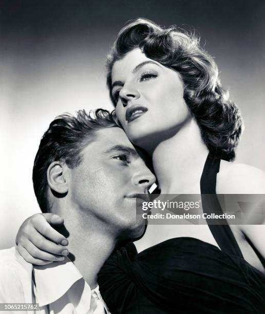 Actress Corinne Calvet and Burt Lancaster in a scene from the movie "Rope of Sand"