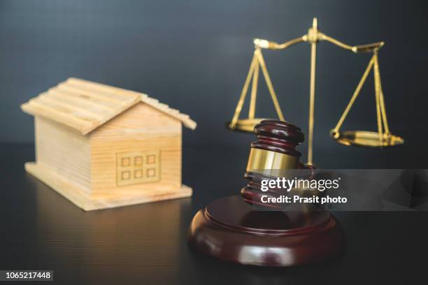 real estate sale auction concept - gavel and house model. - bankruptcy law stock pictures, royalty-free photos & images