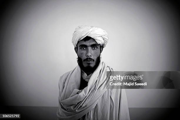 Surrendering Taliban militants are presented to the media while being held for safety in a mosque belonging the NDS on November 4, 2010 in Herat,...
