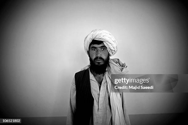 Surrendering Taliban militants are presented to the media while being held for safety in a mosque belonging the NDS on November 4, 2010 in Herat,...