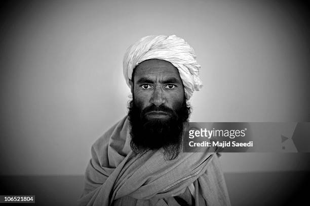 Surrendering Taliban militants are presented to the media while being held for safety in a mosque belonging the NDS on November 4, 2010 in Herat,...