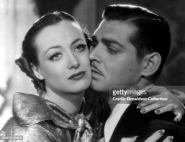 Actress Joan Crawford and Clark Gable in a scene from the movie "Chained"
