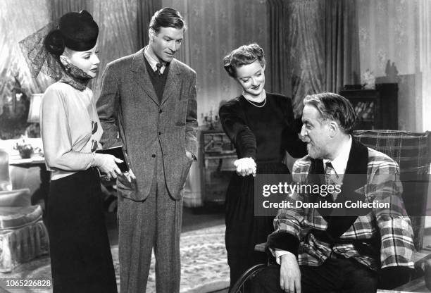 Actress Bette Davis, Ann Sheridan, Reginald Gardiner, Monty Woolley in a scene from the movie "The Man Who Came to Dinner"