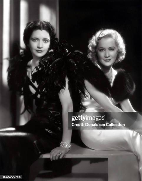 Actress Kay Francis and Miriam Hopkins in a scene from the movie "Trouble in Paradise"