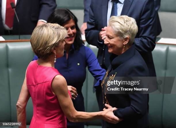 Independent Kerryn Phelps is hugged by former deputy PM Julie Bishop and Chisholm MP Julia Banks as she is officially sworn into parliament at...