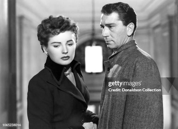 Actress Coleen Gray and Ricard Conte in a scene from the movie "The Sleeping City"