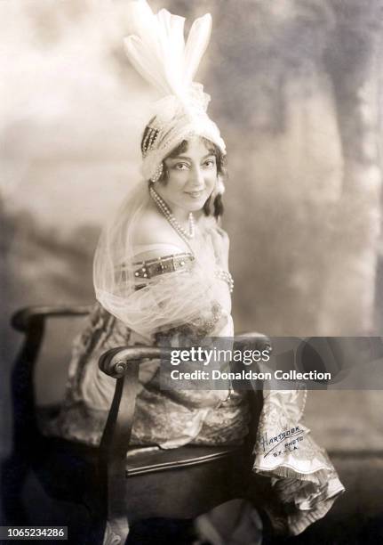 Actress Anna Held poses for a portrait