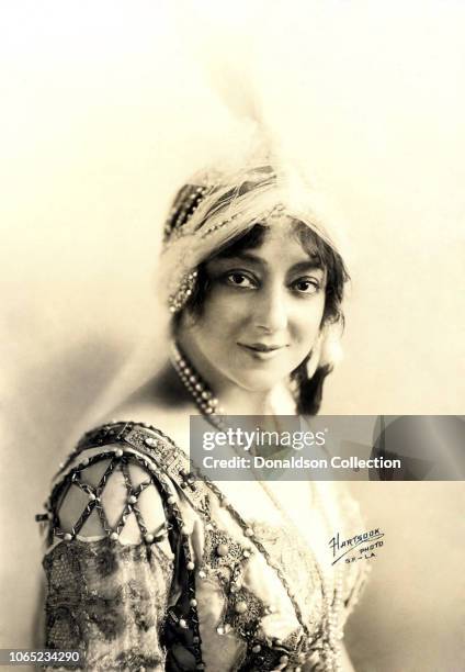 Actress Anna Held poses for a portrait