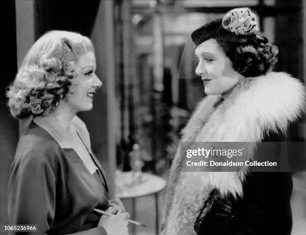 Actress Jean Harlow and Myrna Loy in a scene from the movie "Wife vs. Secretary"