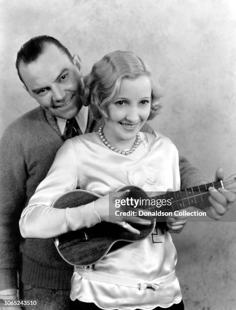 Actress Bessie Love and Cliff Edwards in a scene from the movie "The Broadway Melody"