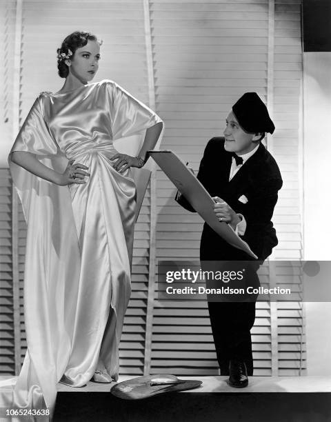 Actress Ida Lupino and Jack Benny in a scene from the movie "Artists and Models"