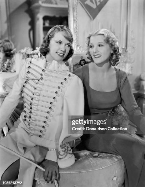 Actress Eleanor Powell and Ilona Massey in a scene from the movie "Rosalie"