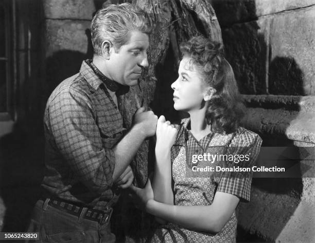 Actress Ida Lupino and Jean Gabin in a scene from the movie "Moontide"