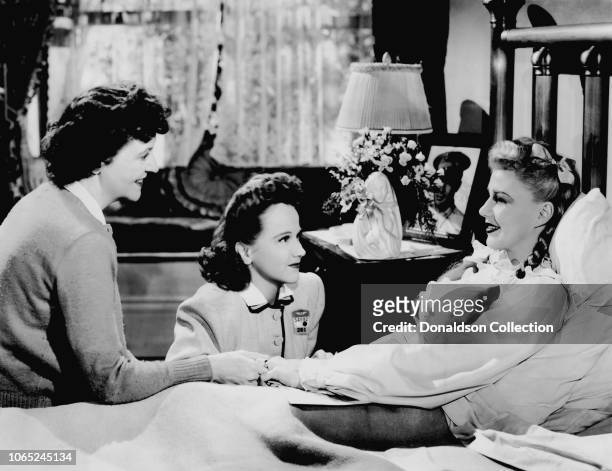 Actress Ginger Rogers with Patricia Collinge and Kim Hunter in a scene from the movie "Tender Comrade"