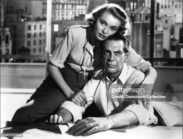 Actress Patricia Neal and Raymond Massey in a scene from the movie "The Fountainhead"