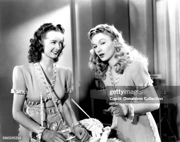Actress Noel Neill and Veronica Lake in a scene from the movie "Bring on the Girls"