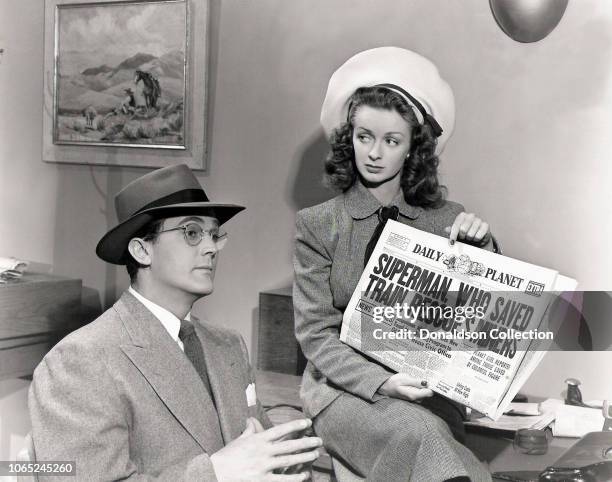 Actress Noel Neill and Kirk Alyn in a scene from the movie "Adventures of Superman"