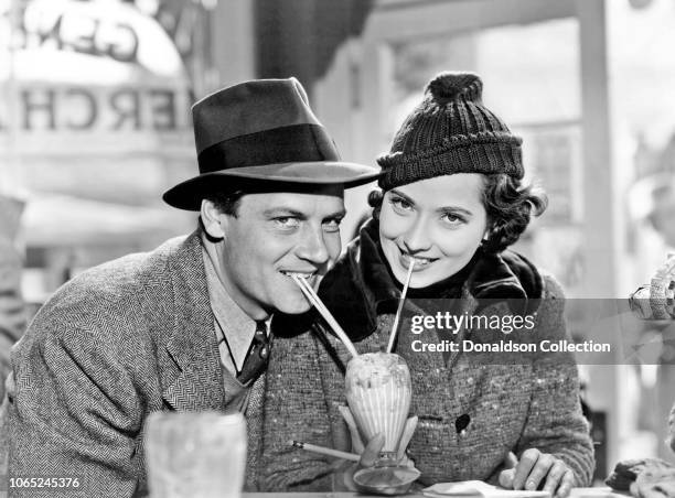 Actress Merle Oberon and Joel McCrea in a scene from the movie "These Three"