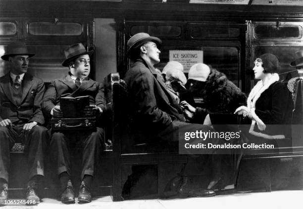 Actress Anny Ondra, Alfred Hitchcock and John Longden in a scene from the movie "Blackmail"