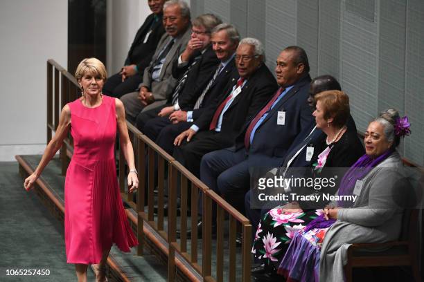 Former deputy Prime Minister Julie Bishop greets guest speakers as she arrives at question time at Parliament House on November 26, 2018 in Canberra,...