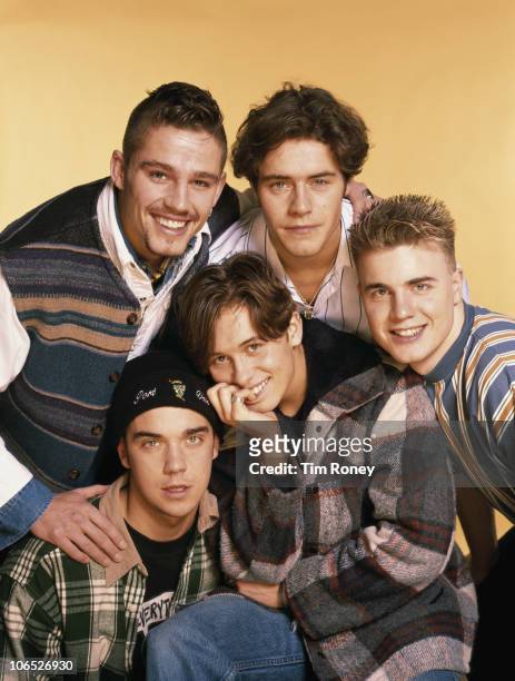 English boy band Take That, circa 1993. Clockwise, from top left: Jason Orange, Howard Donald, Gary Barlow, Mark Owen and Robbie Williams.