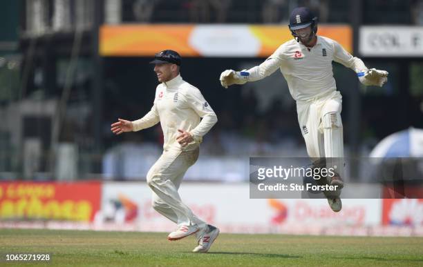 England bowler Jack Leach celebrates with Ben Foakes after running out Sri Lanka batsman Kusal Mendis during Day Four of the Third Test match between...