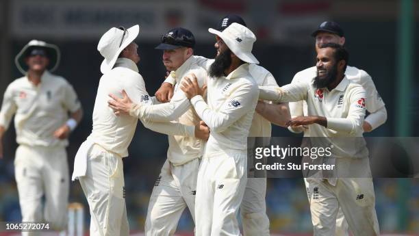 England fielder Jack Leach celebrates with team mates after running out Sri Lanka batsman Kusal Mendis during Day Four of the Third Test match...
