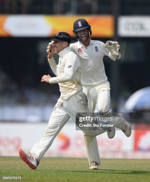 England fielder Jack Leach celebrates with Ben Foakes after running out Sri Lanka batsman Kusal Mendis during Day Four of the Third Test match...