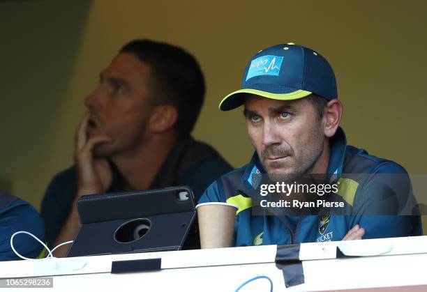 Justin Langer, coach of Australia, and Shaun Marsh of Australia look on during game two of the Gillette One Day International series between...