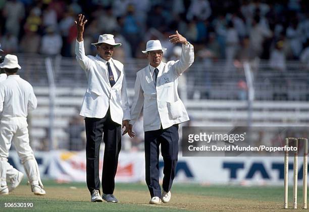 Umpires Srinivas Venkataraghaven and Piloo Reporter call for drinks during the 3rd Test match between India and England at the Wankhede Stadium in...
