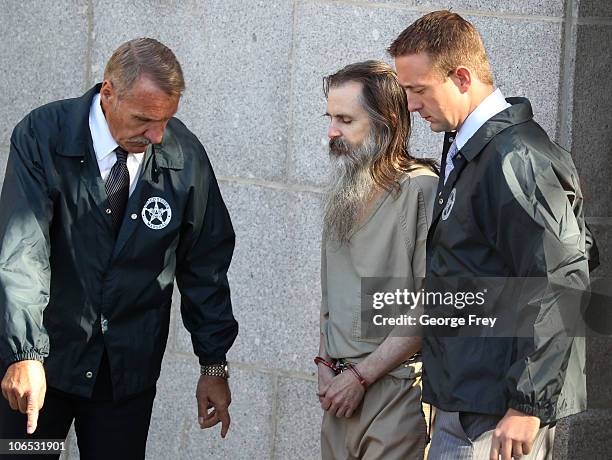 Brian David Mitchell , alleged kidnapper of Elizabeth Smart, is led out of Federal Court by federal marshall's to a waiting car on November, 4 2010...