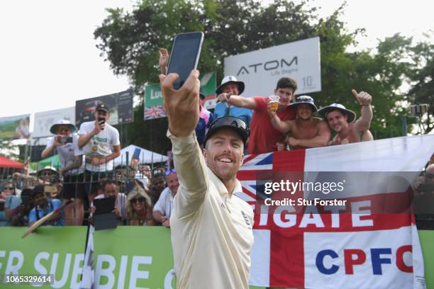 Man of the match Jack Leach poses for pictures with fans after Day Four of the Third Test match between Sri Lanka and England at Sinhalese Sports...