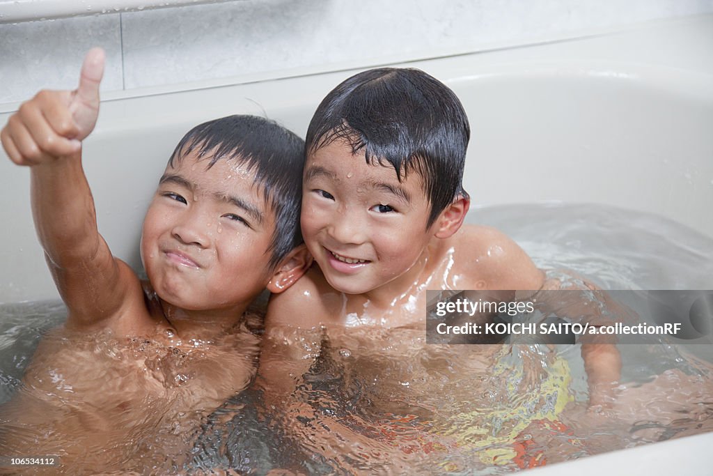 Boys taking a bath, Japan