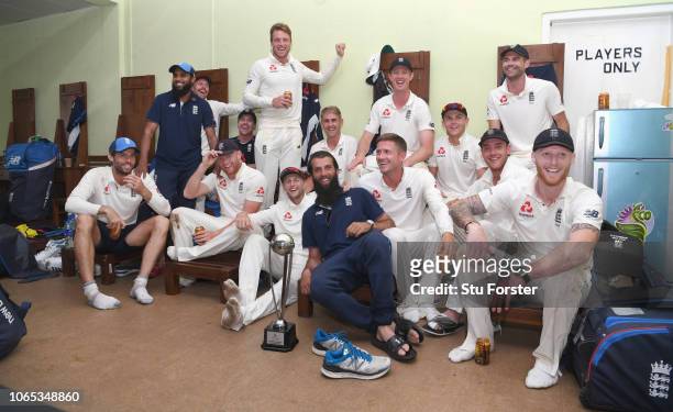 The England players celebrate in the dressing room after their 3-0 series victory during Day Four of the Third Test match between Sri Lanka and...