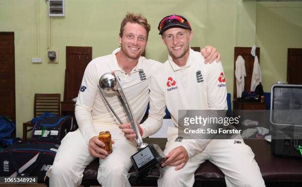England captain Joe Root with vice captain Jos Buttler with the trophy in the dressing room after their 3-0 series victory after Day Four of the...