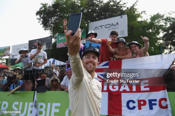 Man of the match Jack Leach poses for pictures with fans after their 3-0 series victory after Day Four of the Third Test match between Sri Lanka and...
